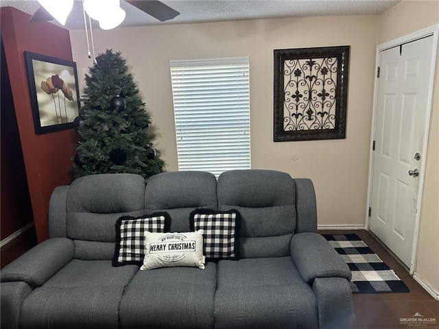 2104 Fairmont Ave, Mcallen, TX 78504 - living room featuring a ceiling fan and baseboards