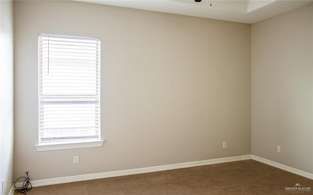 503 W 12th St, Weslaco, TX 78596 - tiled empty room featuring baseboards