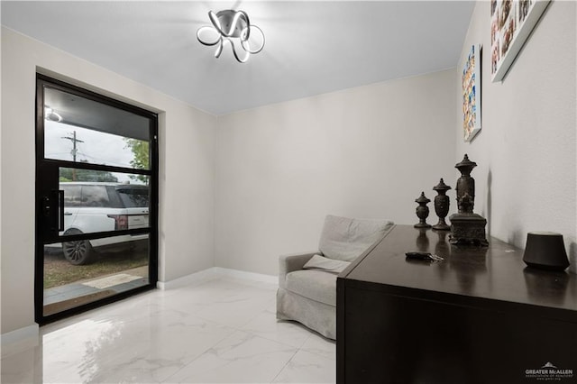 1201 S Danner Rd, Pharr, TX 78577 - sitting room with light marble finish flooring and baseboards