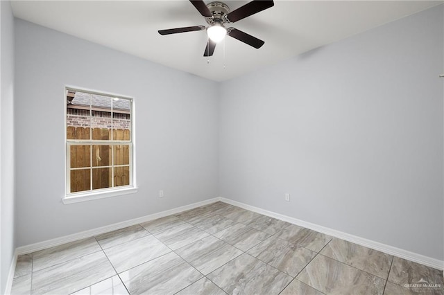 unfurnished room featuring ceiling fan and light tile patterned floors