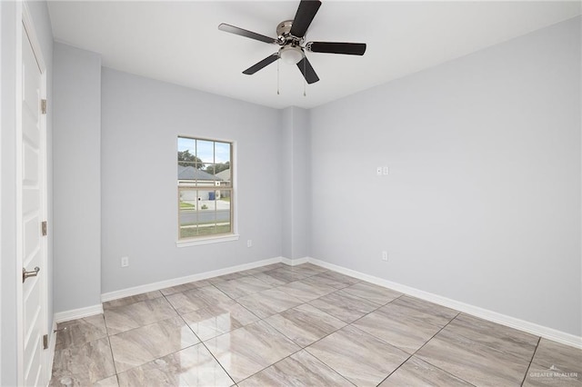 spare room featuring ceiling fan