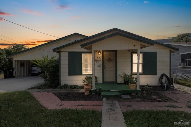 view of front of home featuring a carport