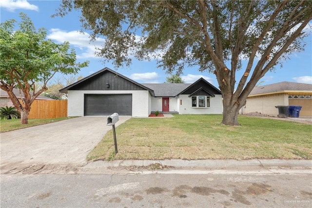 ranch-style house with a garage and a front yard