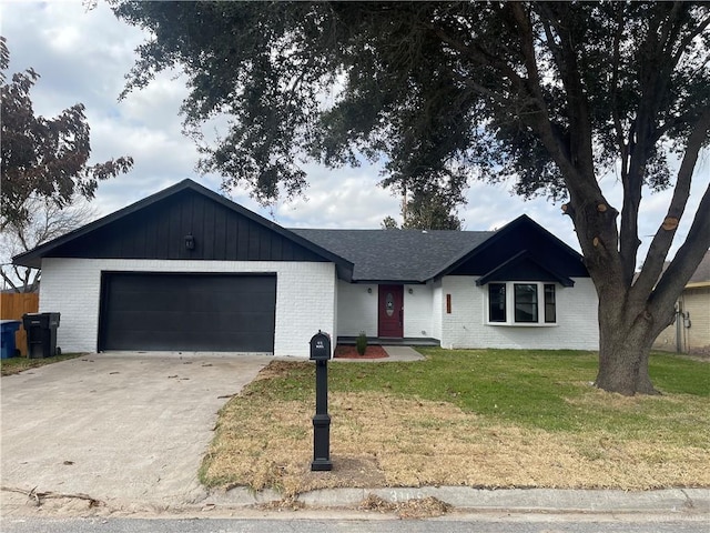 ranch-style house with a garage and a front lawn