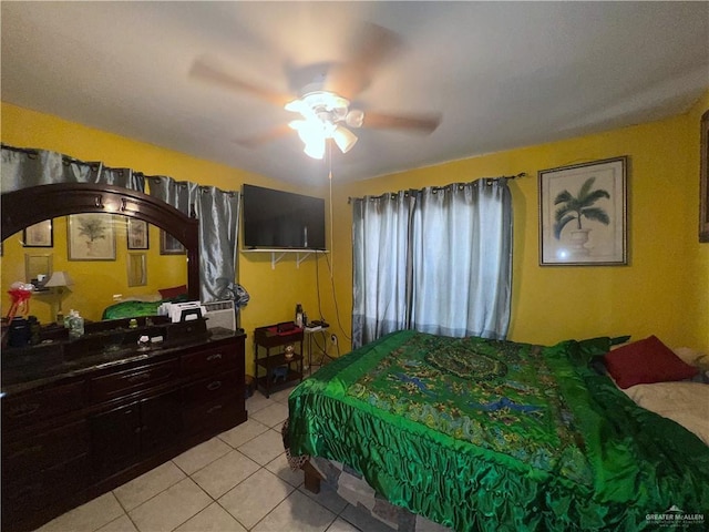 bedroom featuring ceiling fan and light tile patterned floors