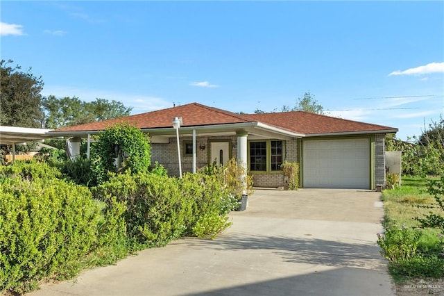 ranch-style house featuring a garage