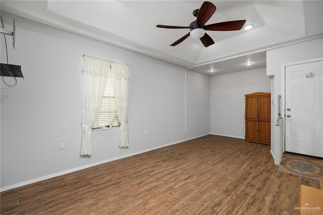 unfurnished room featuring hardwood / wood-style floors and ceiling fan