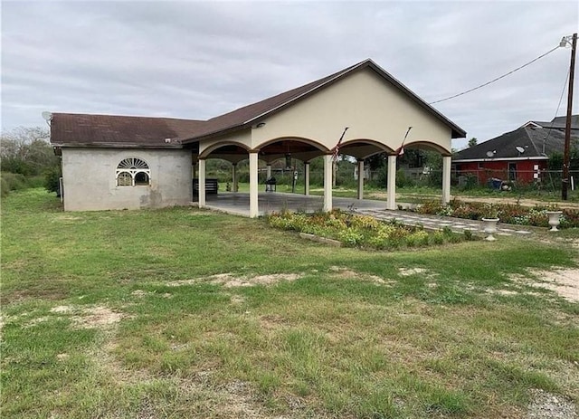 exterior space with a lawn