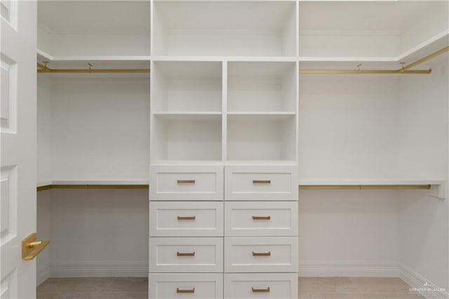 5407 Common Ln, Weslaco, TX 78596 - spacious closet with light tile patterned floors