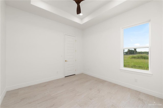 5407 Common Ln, Weslaco, TX 78596 - unfurnished room with baseboards, recessed lighting, a tray ceiling, and ceiling fan