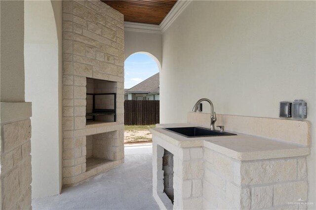 5407 Common Ln, Weslaco, TX 78596 - view of patio with a sink, area for grilling, and an outdoor fireplace