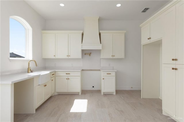 5407 Common Ln, Weslaco, TX 78596 - kitchen with recessed lighting, a sink, and light wood finished floors