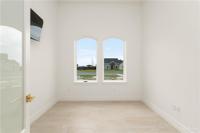 5407 Common Ln, Weslaco, TX 78596 - spare room featuring baseboards