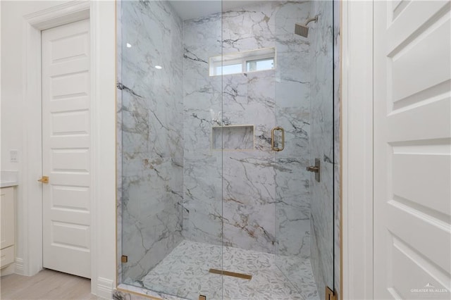 5407 Common Ln, Weslaco, TX 78596 - full bath with a marble finish shower, vanity, and wood finished floors