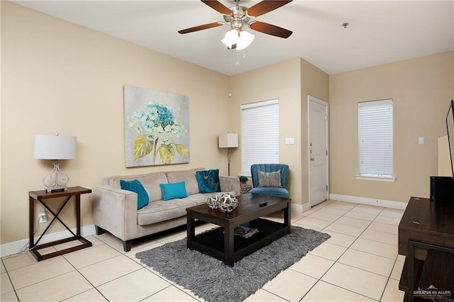 tiled living room featuring ceiling fan