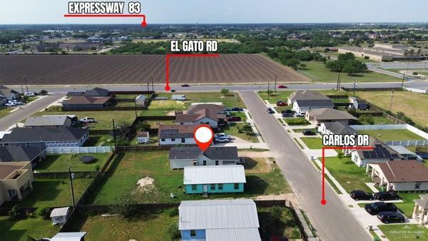 1311 Carlos Dr, Alamo, TX 78516 - aerial view of residential area