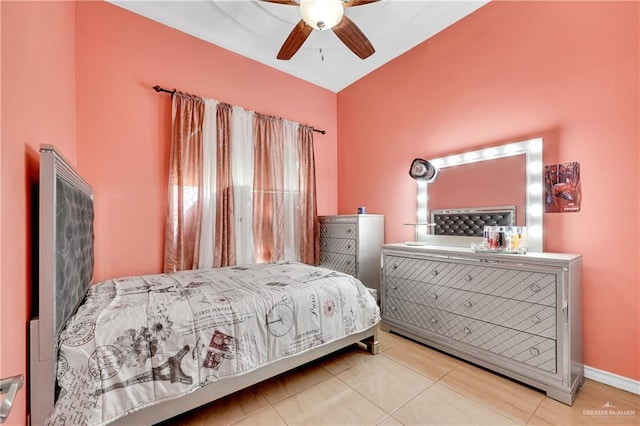 tiled bedroom with ceiling fan