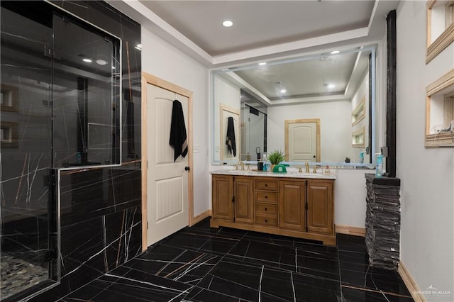 2115 Mile 3 N, Mercedes, TX 78570 - bathroom featuring double vanity, a tray ceiling, a stall shower, baseboards, and recessed lighting