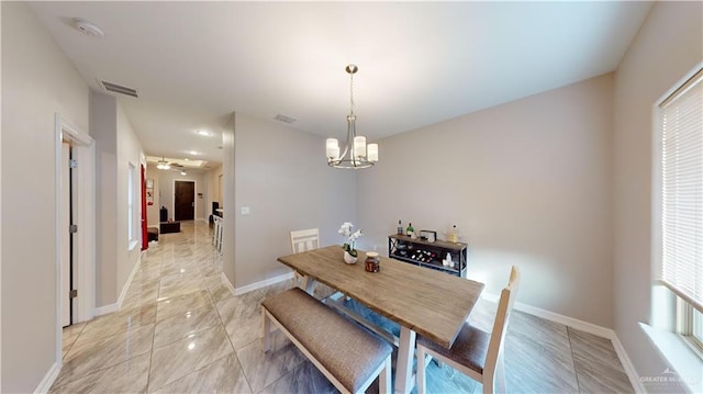 dining room with an inviting chandelier