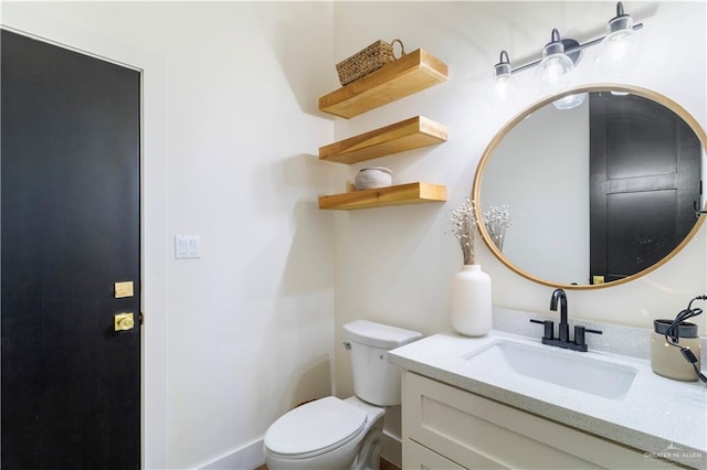 half bath with toilet and vanity