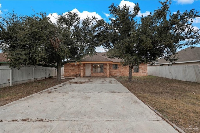 exterior space with a front lawn