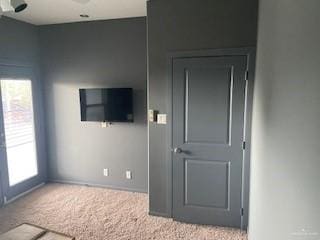 unfurnished bedroom featuring carpet flooring