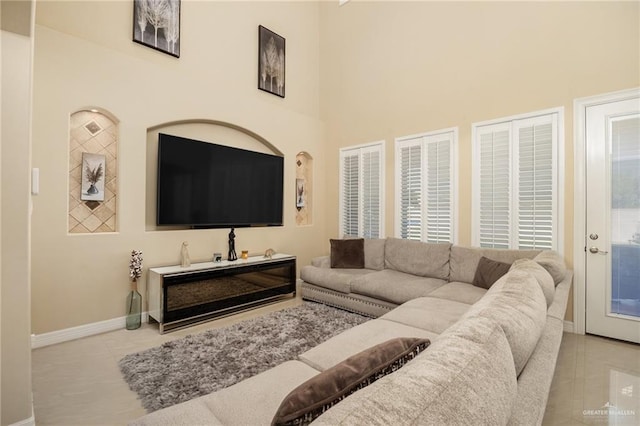 living room with light tile patterned floors