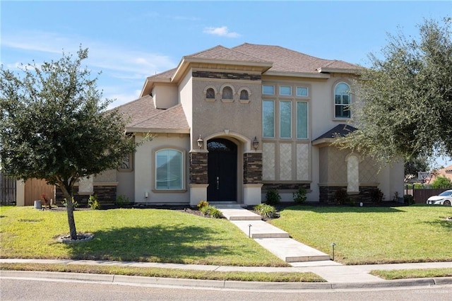 mediterranean / spanish-style home with a front lawn