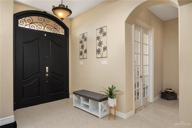 entrance foyer featuring french doors