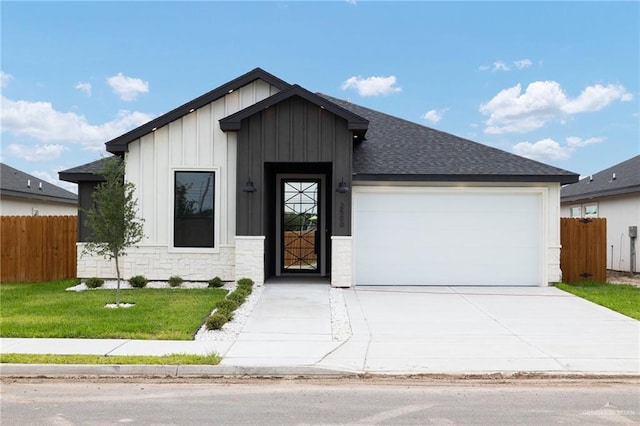 single story home with fence, an attached garage, a shingled roof, and board and batten siding