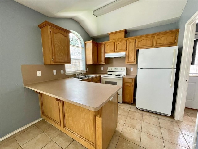 kitchen with lofted ceiling, light tile patterned flooring, a peninsula, white appliances, and under cabinet range hood