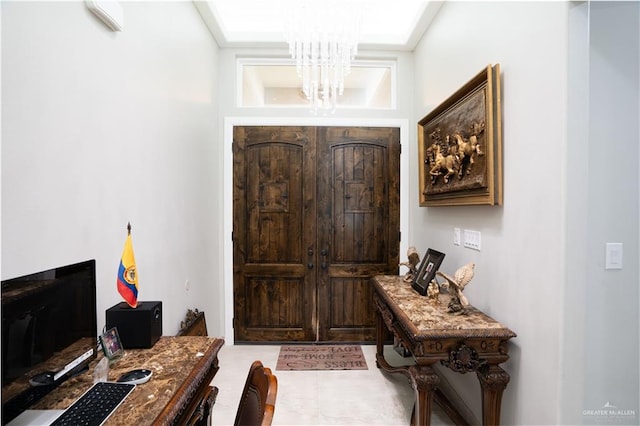 entrance foyer featuring a notable chandelier