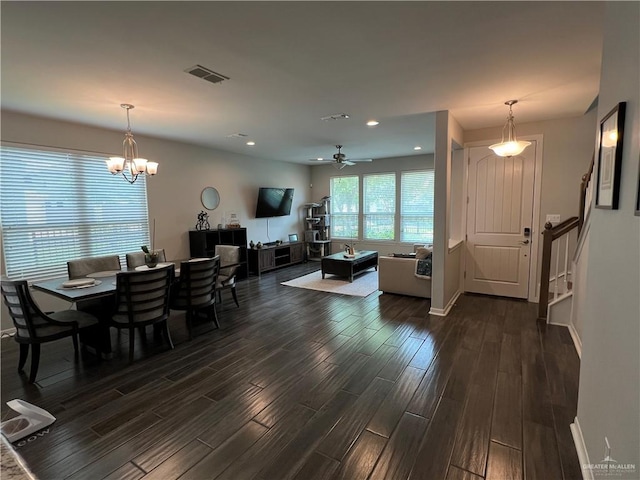 10228 N 14th St, Mcallen, TX 78504 - dining space with dark wood-style flooring, a chandelier, recessed lighting, and ceiling fan