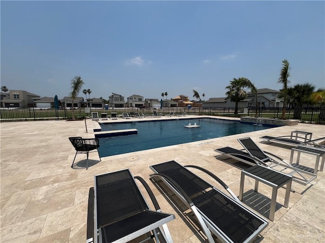 10228 N 14th St, Mcallen, TX 78504 - community pool featuring a patio and a residential view