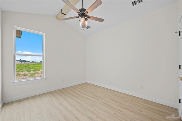 empty room featuring vaulted ceiling with beams, light hardwood / wood-style flooring, a wealth of natural light, and ceiling fan