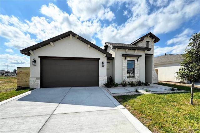 view of front of property featuring a front lawn and a garage