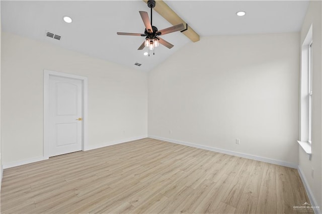 empty room featuring vaulted ceiling with beams, ceiling fan, and light hardwood / wood-style floors