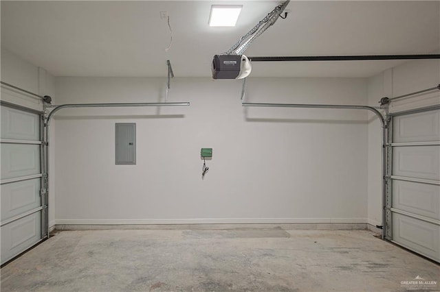 garage with electric panel and a garage door opener