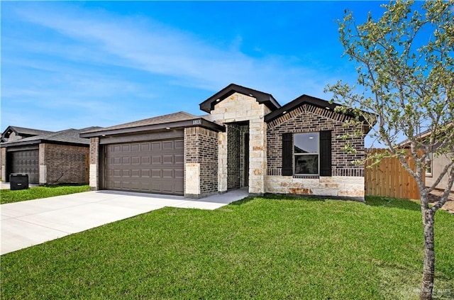 view of front of property with an attached garage, a front lawn, driveway, and stone siding