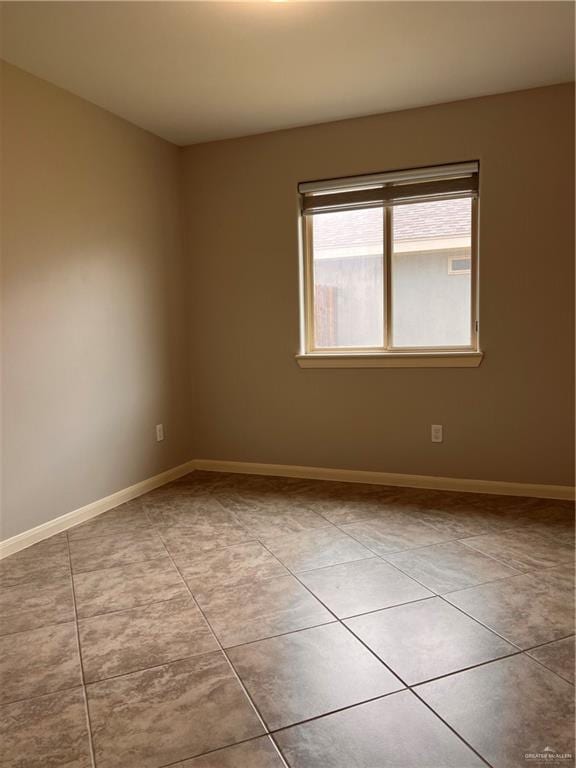 view of tiled empty room