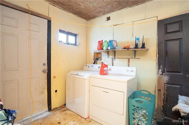 washroom featuring independent washer and dryer