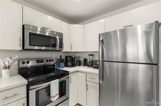 kitchen with white cabinets and stainless steel appliances