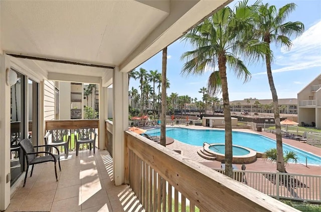 view of pool with a community hot tub