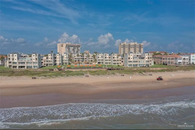 property view of water featuring a beach view