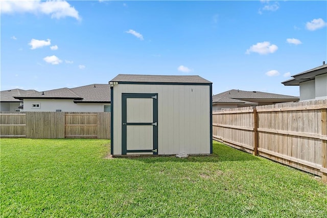 view of outdoor structure with a yard