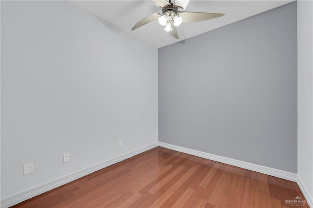 3207 E San Luis Cir, Mission, TX 78573 - empty room featuring a ceiling fan, baseboards, and wood finished floors