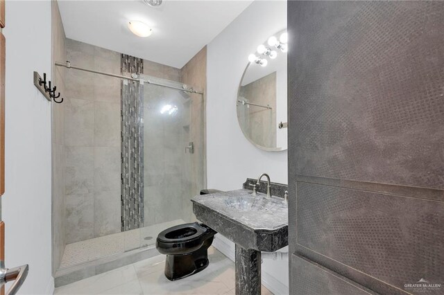 3207 E San Luis Cir, Mission, TX 78573 - bathroom featuring a shower stall and toilet