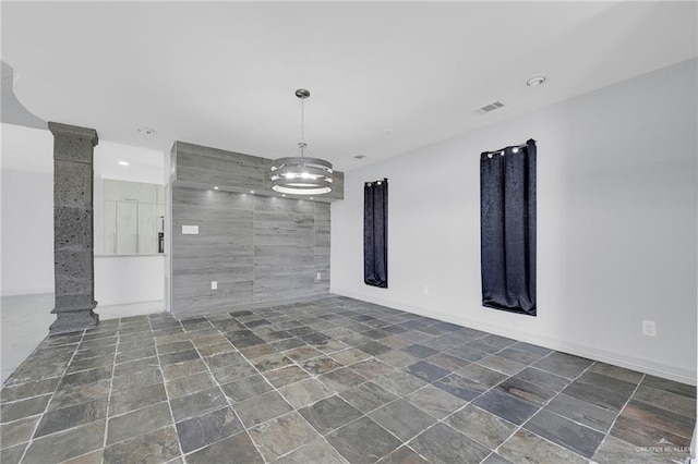 3207 E San Luis Cir, Mission, TX 78573 - unfurnished room with decorative columns, a chandelier, recessed lighting, and baseboards