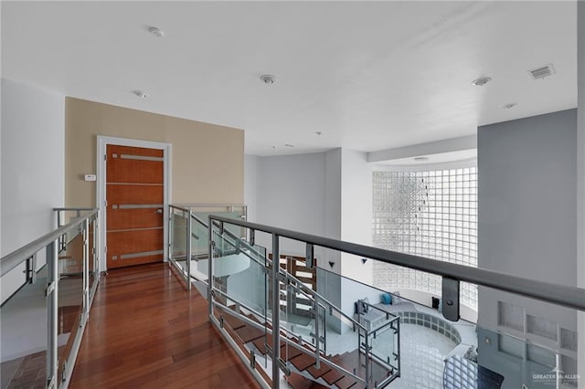 3207 E San Luis Cir, Mission, TX 78573 - corridor featuring an upstairs landing and wood finished floors