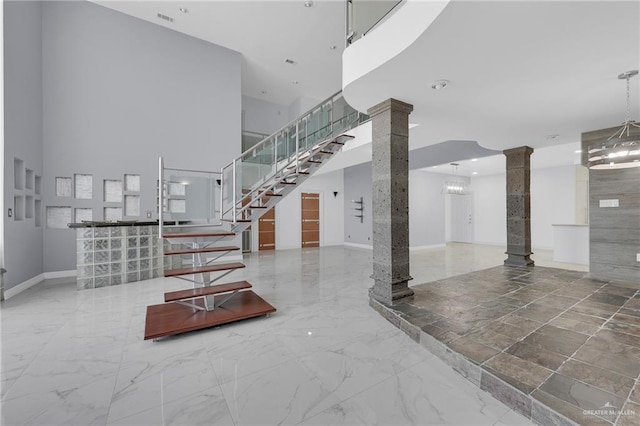 3207 E San Luis Cir, Mission, TX 78573 - building lobby featuring a towering ceiling and stairway